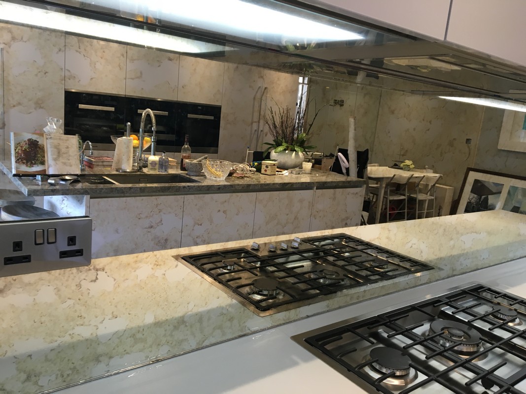 Mirror glass splashback in Bermondsey luxury kitchen